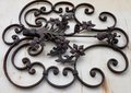 Handcrafted wrought iron ornament with flower arrangement - OS85