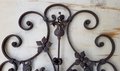 Handcrafted wrought iron ornament with flower arrangement - OS85