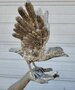 Antike bronzestatue Mädchen mit dem Vogel